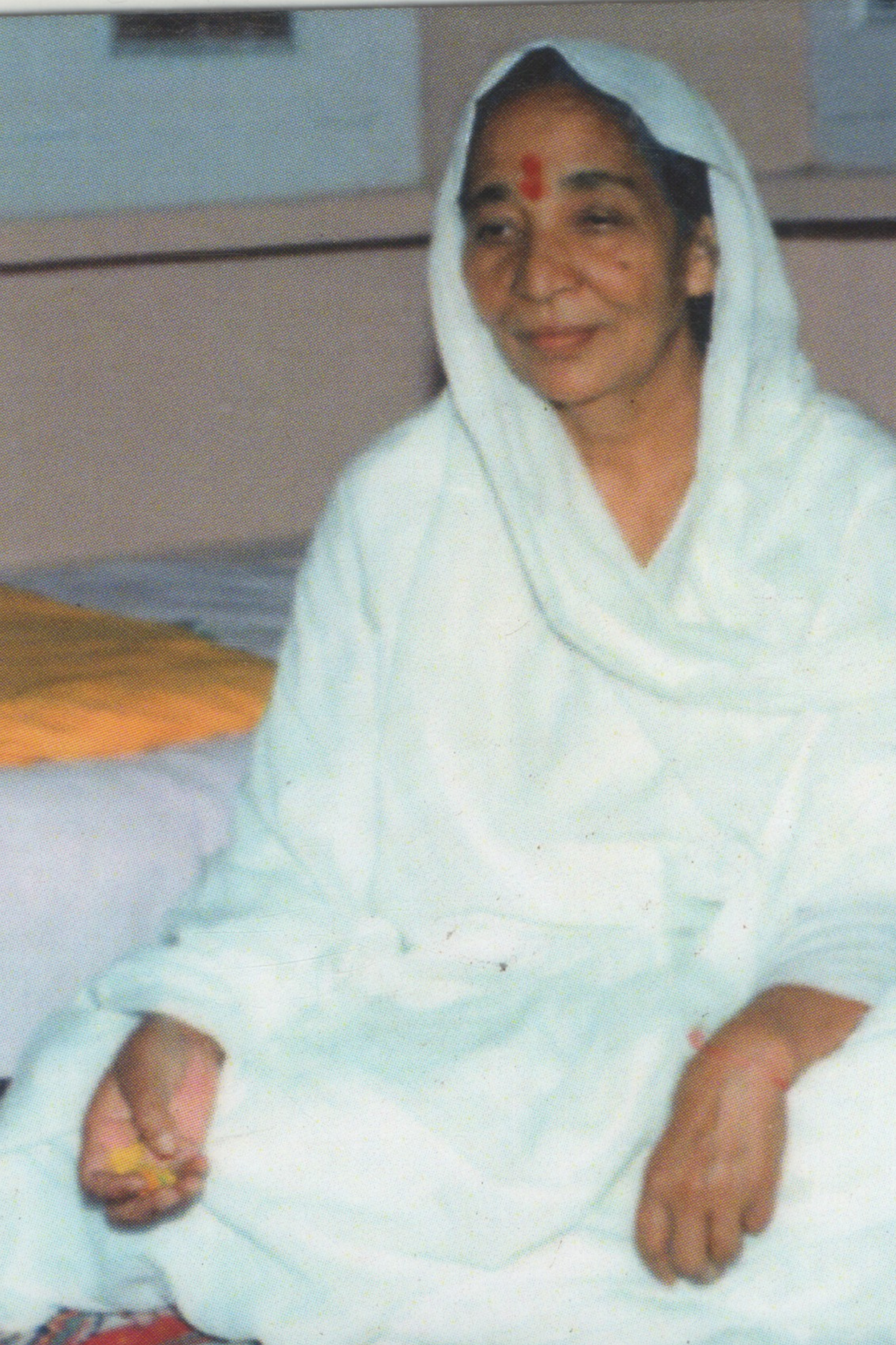 Pocket Sized Laminated Card C52 - Sri Siddhi Maa Sitting with a Photo on the Back of Card