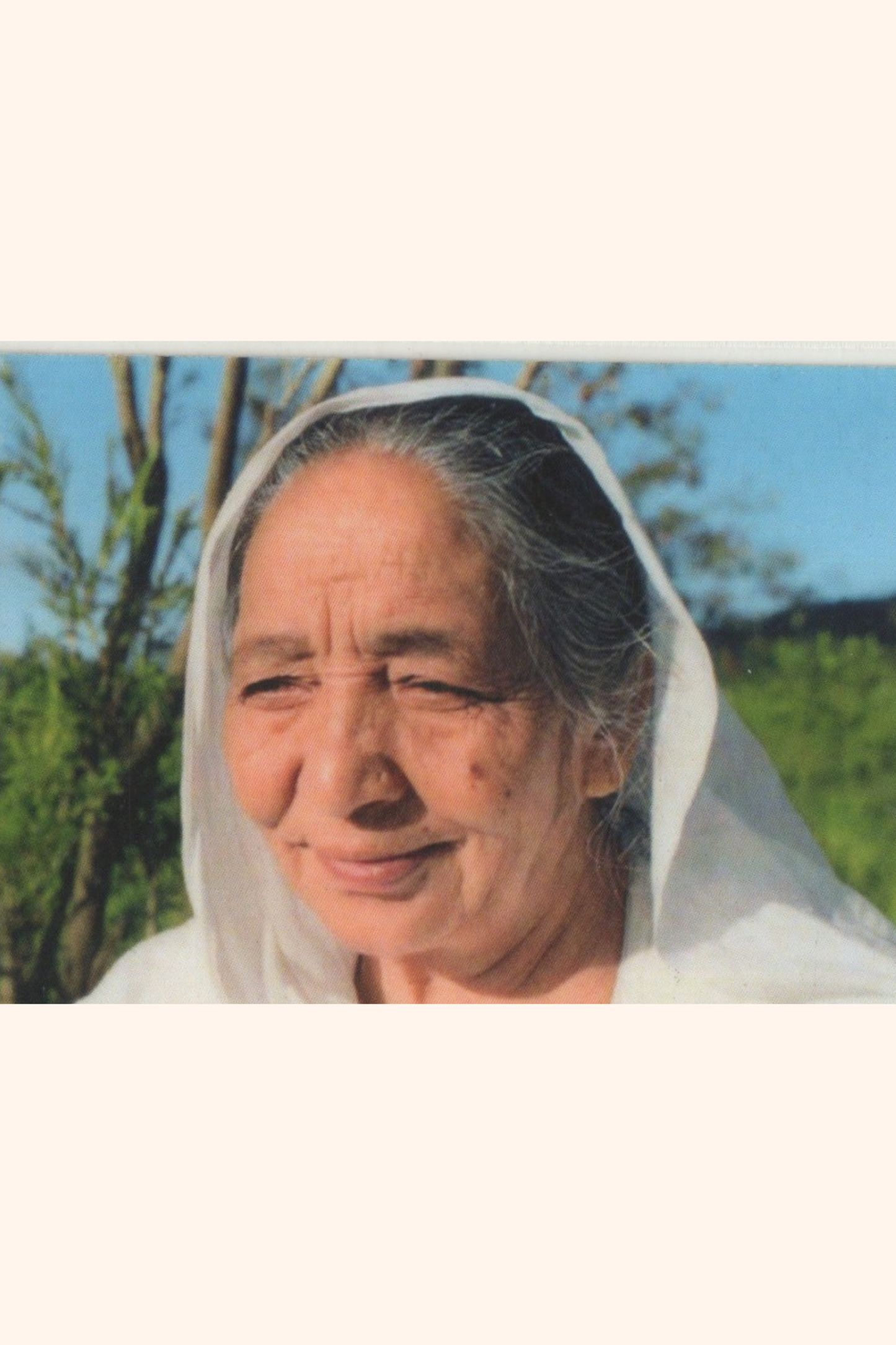 Pocket Sized Laminated Card C56 - Sri Siddhi Maa Close Up with a Photo on the Back of Card